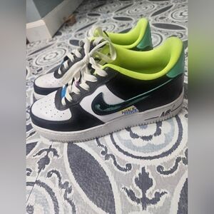 Nike Black and Green Sneakers with Classic Design